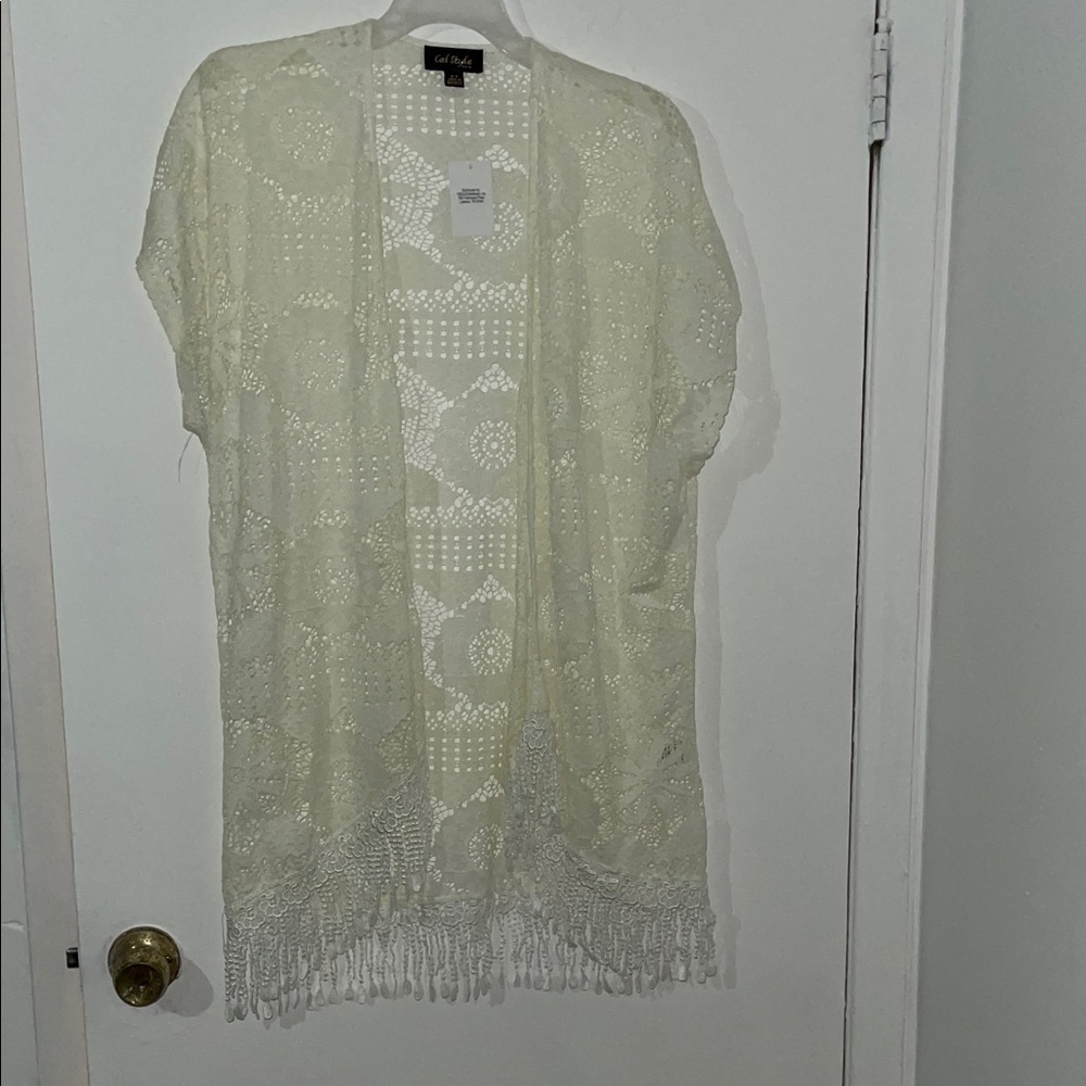 Elegant Cream Cardigan with Fringe